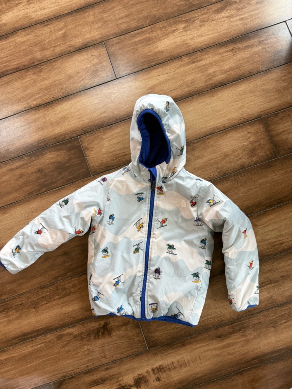 The North Face Kids Hooded Ski Jacket - colorful skiing yetis print